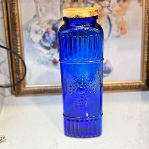 vintage-style triangular cobalt blue glass canister w/ wood lid  11.5”